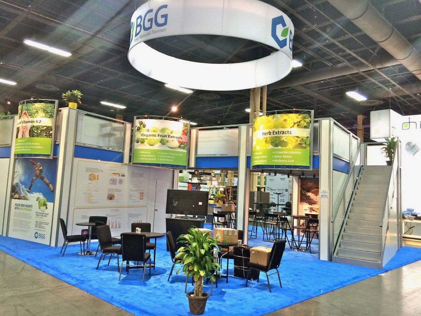 Unusual L shaped two story trade show exhibit rental design in Las Vegas