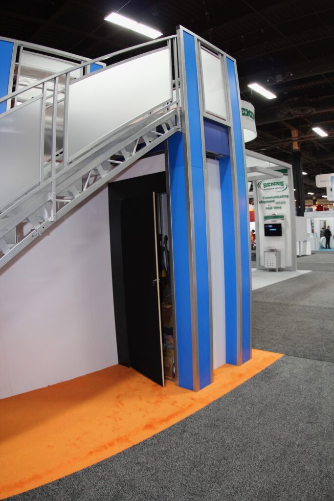 trade show rental double deck design showing storage space below the landing