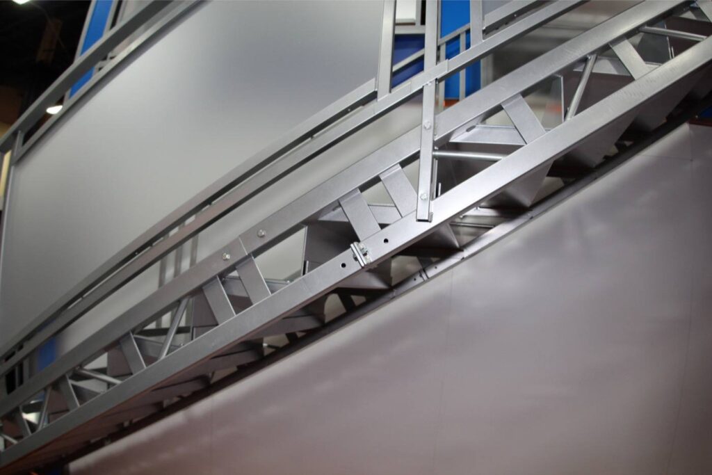 Trade show double deck stair and side rail view