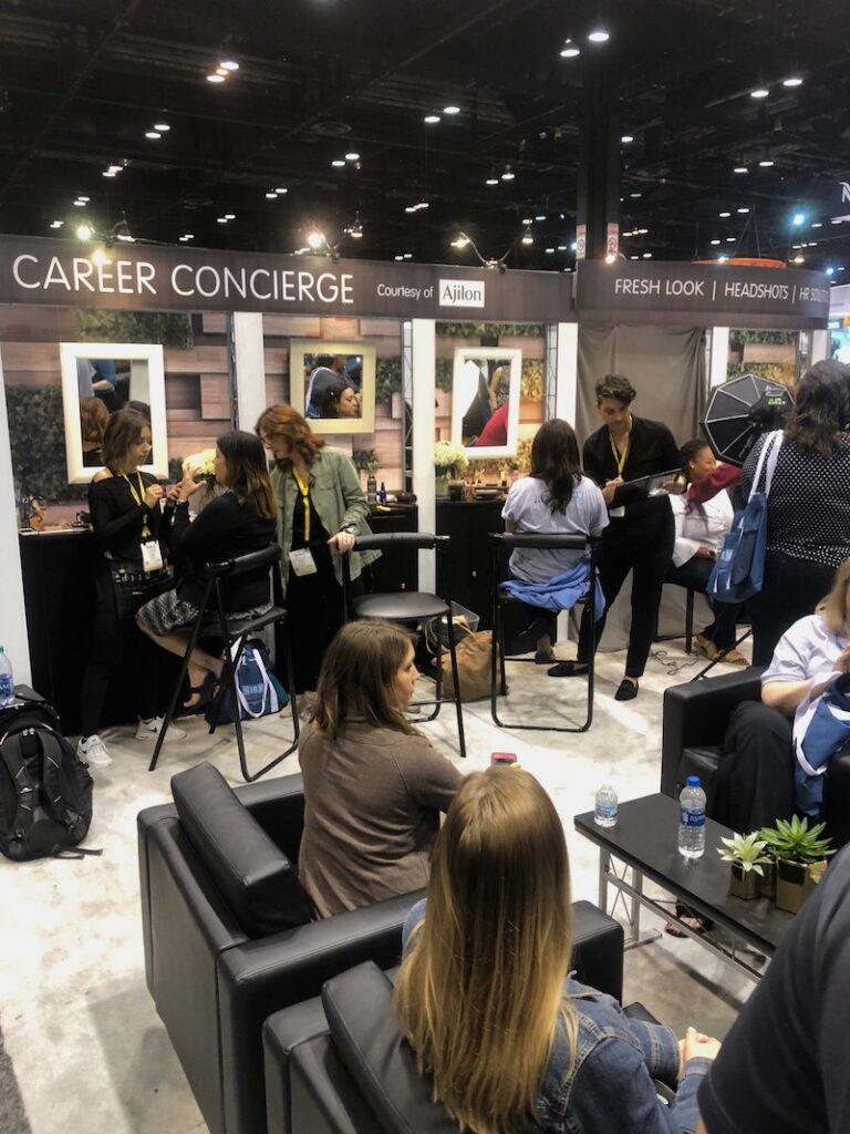 20x20 trade show design idea with work stations lounge furniture to create inviting feel in Las Vegas