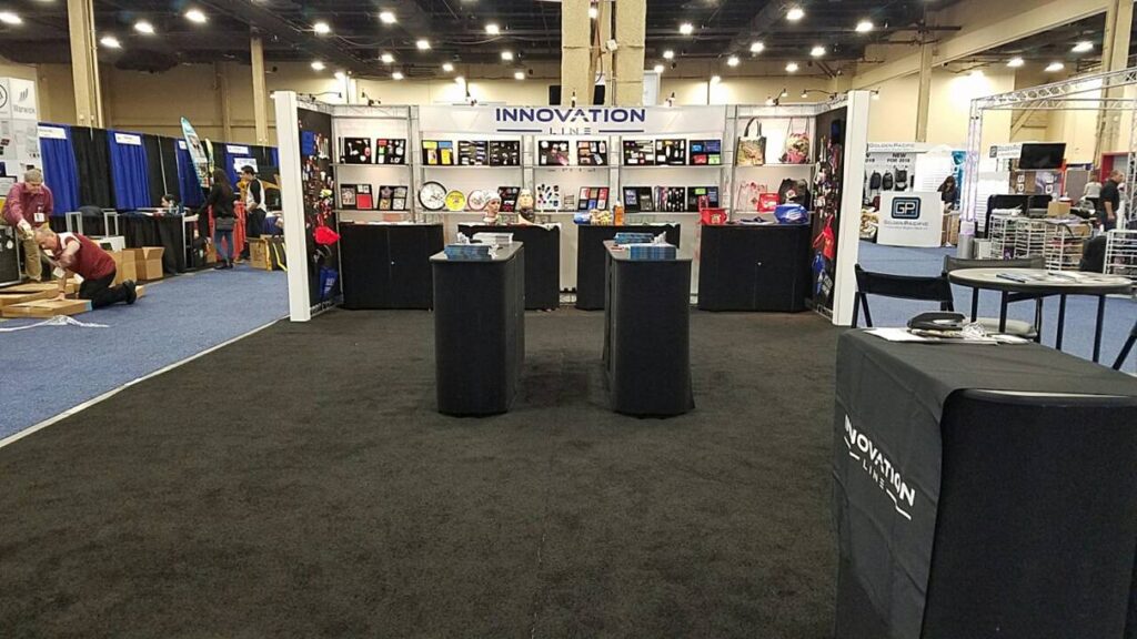 20x20 custom innovation line this backwall combined with product towers show cases much product for value