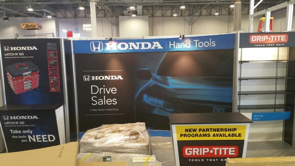 Larger than life billboard graphics on a 20 ft trade show booth