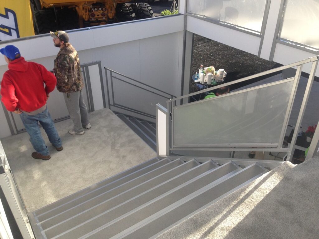 Unique stair design on trade show double deck rental