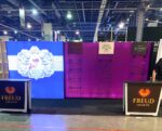 Display For Trade Shows With Grid Wall In 10x20, Backlit Graphics